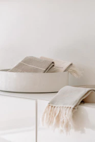 white and gray bed pillow