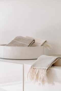 white and gray bed pillow