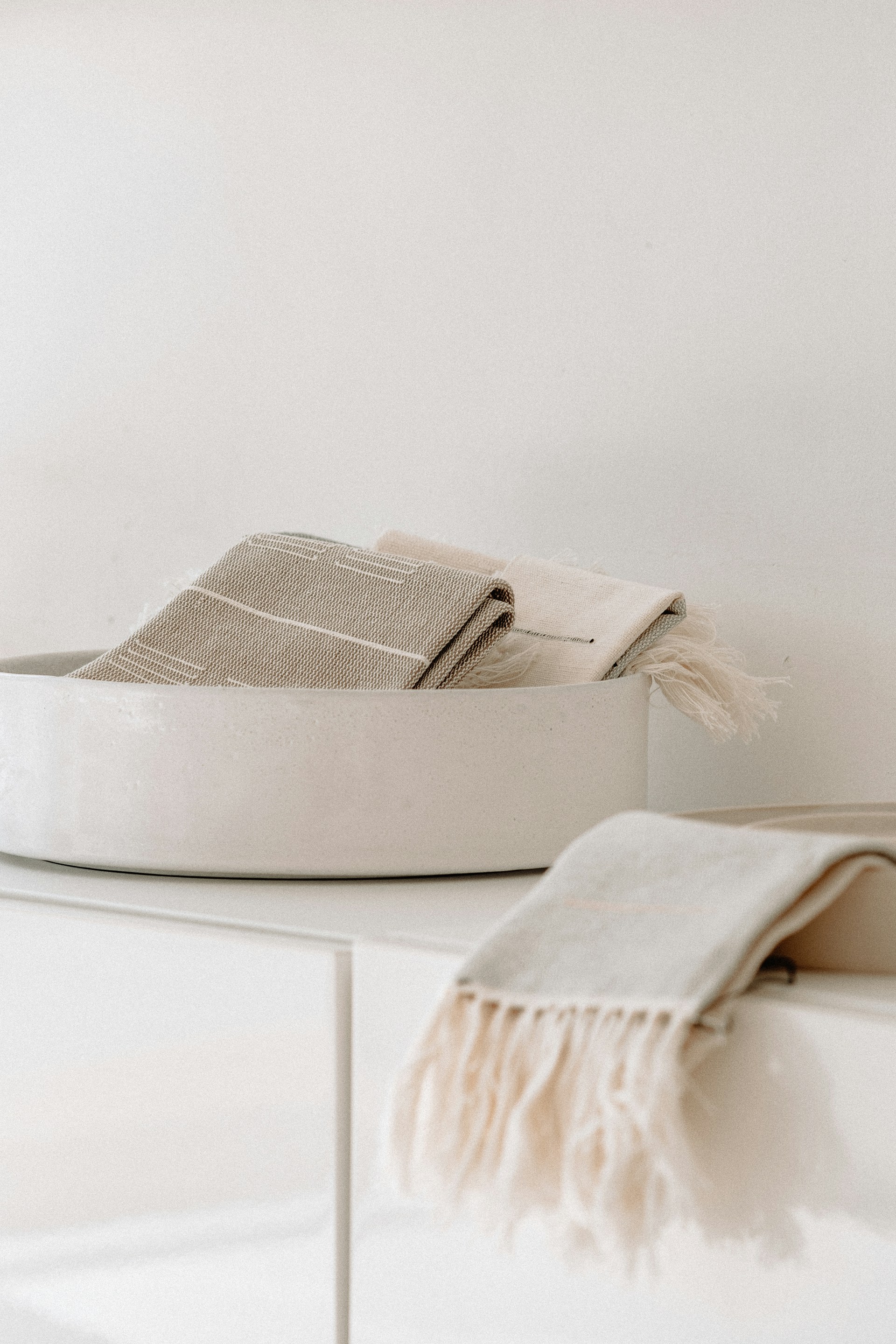 woman wearing yellow long-sleeved dress under white clouds and blue sky during daytime