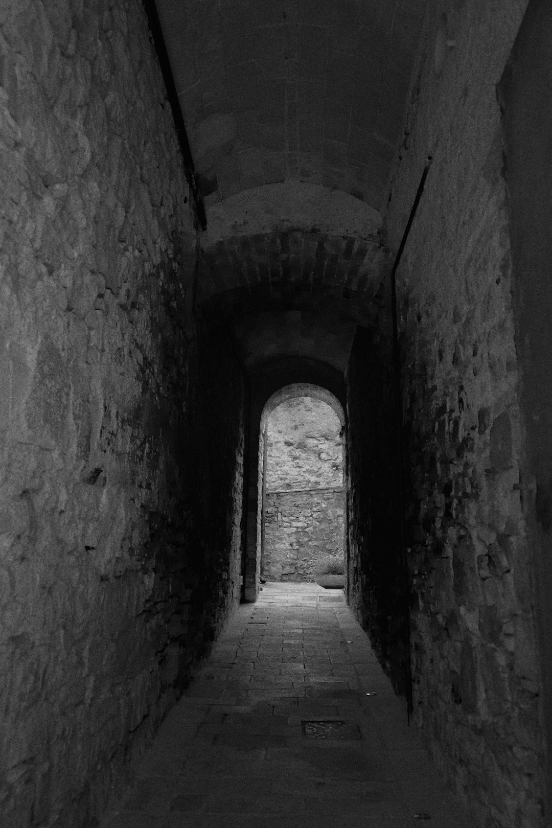 brown concrete tunnel during daytime