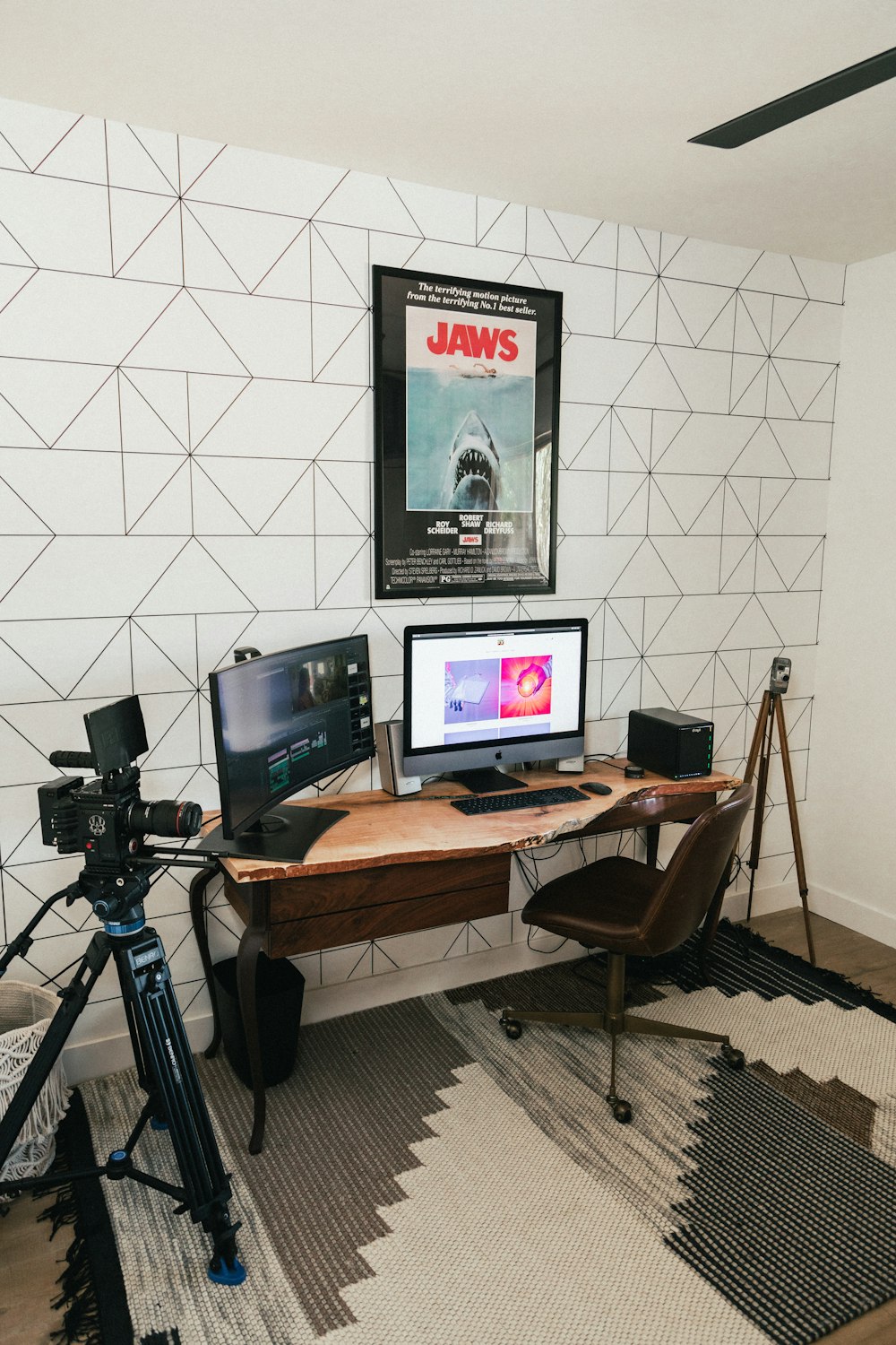 black flat screen computer monitor on brown wooden desk