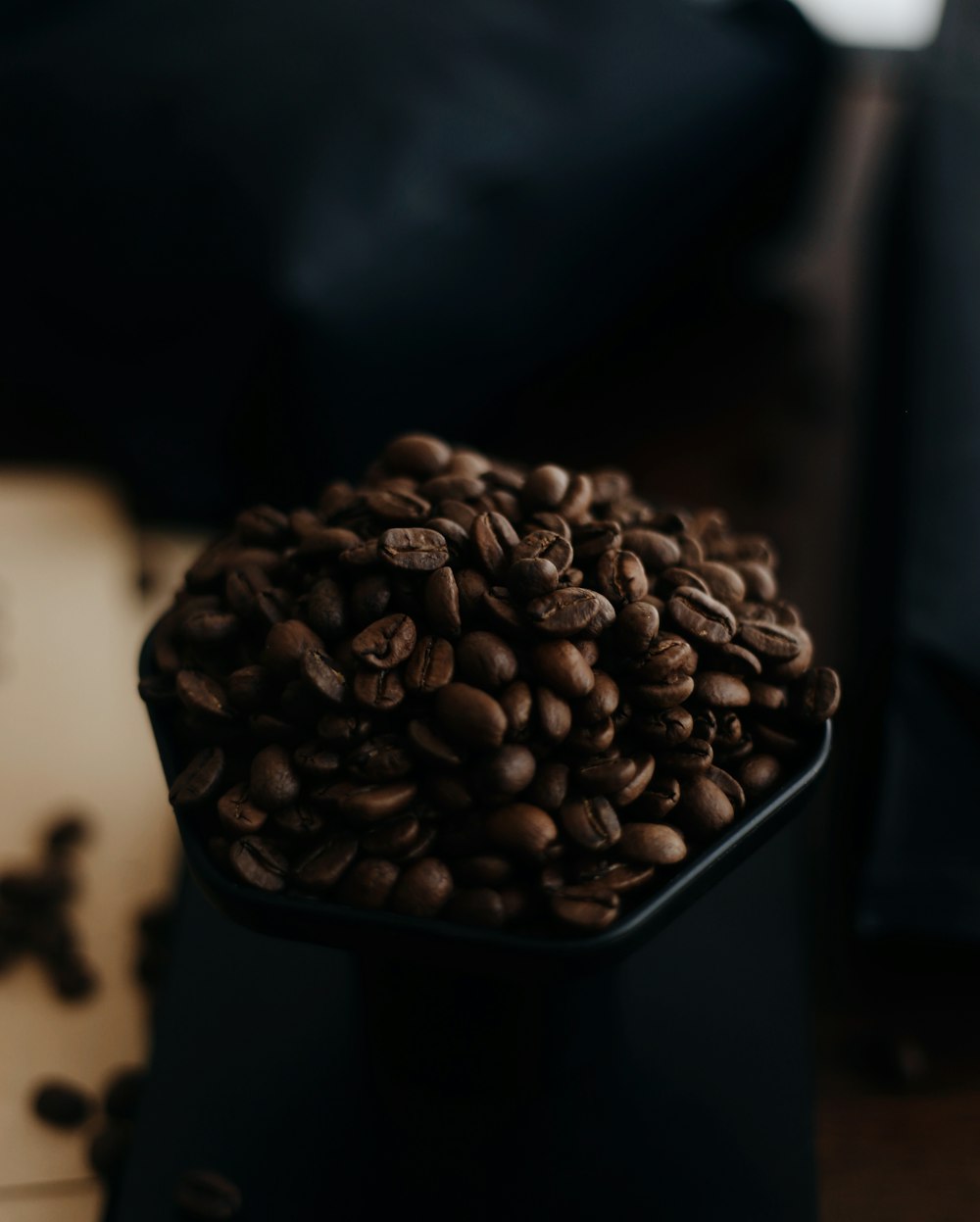 coffee beans on black surface