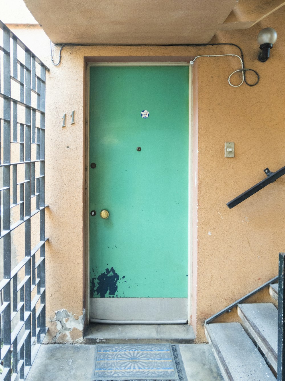 green and brown wooden door