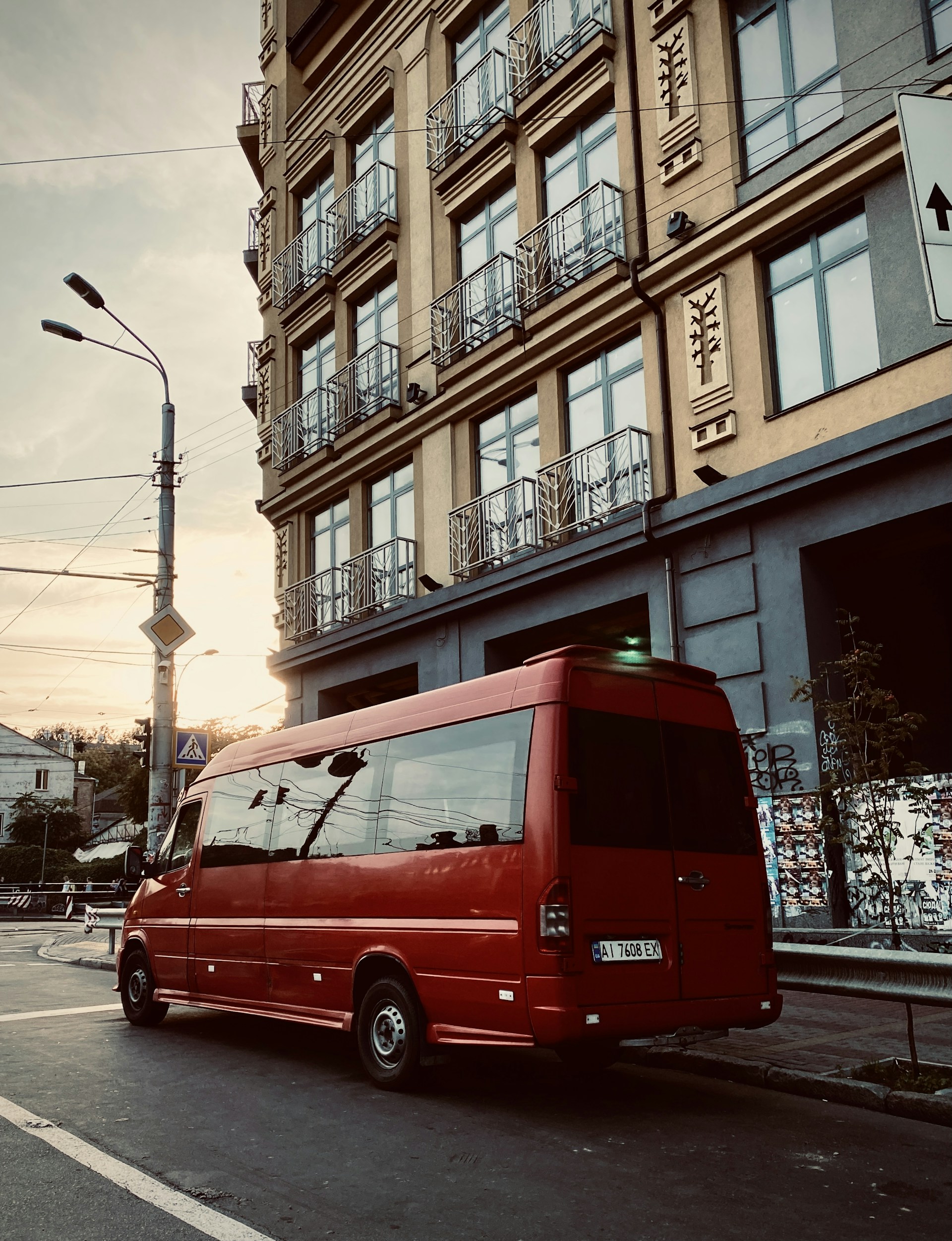 woman wearing yellow long-sleeved dress under white clouds and blue sky during daytime