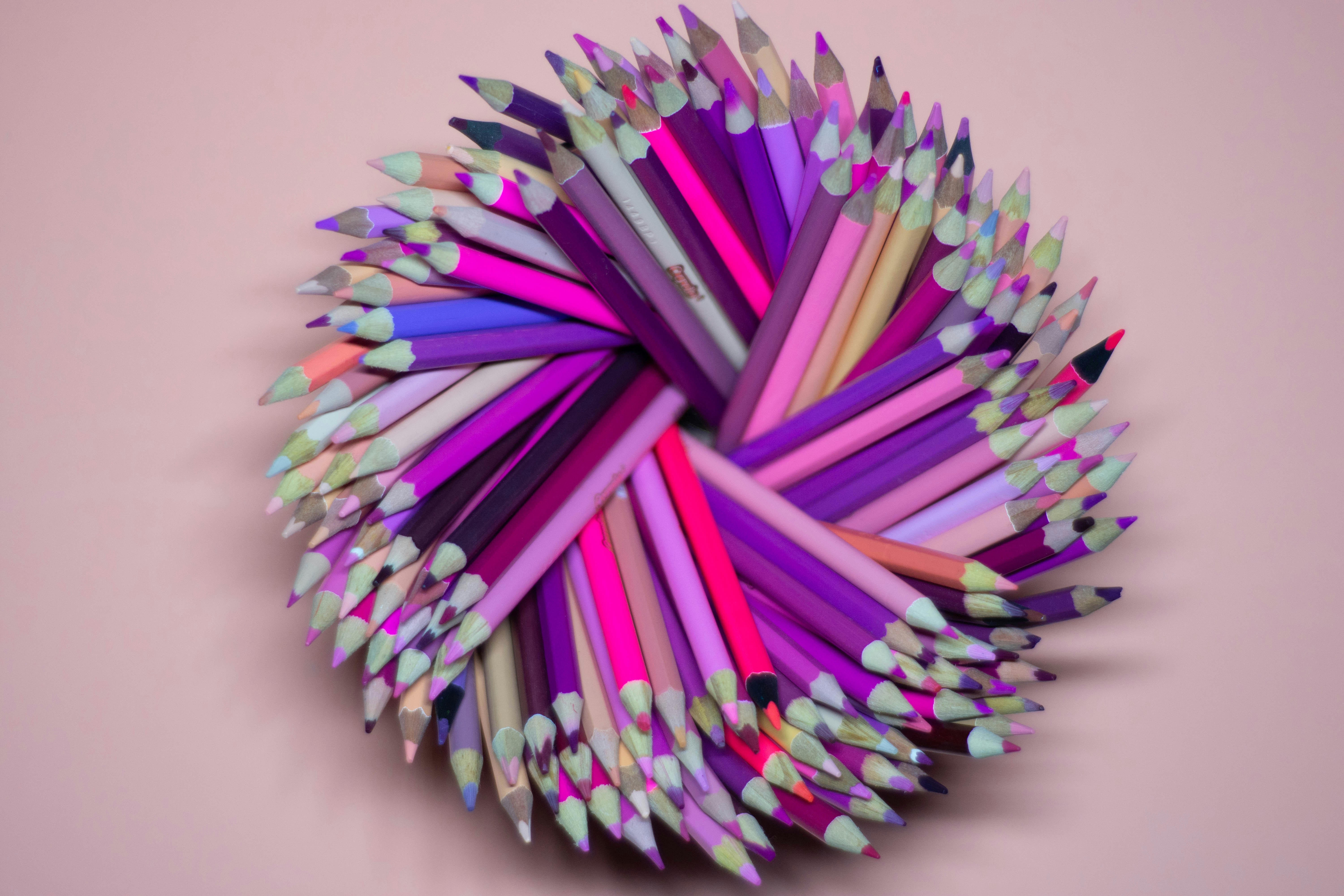 pink blue and purple coloring pencils