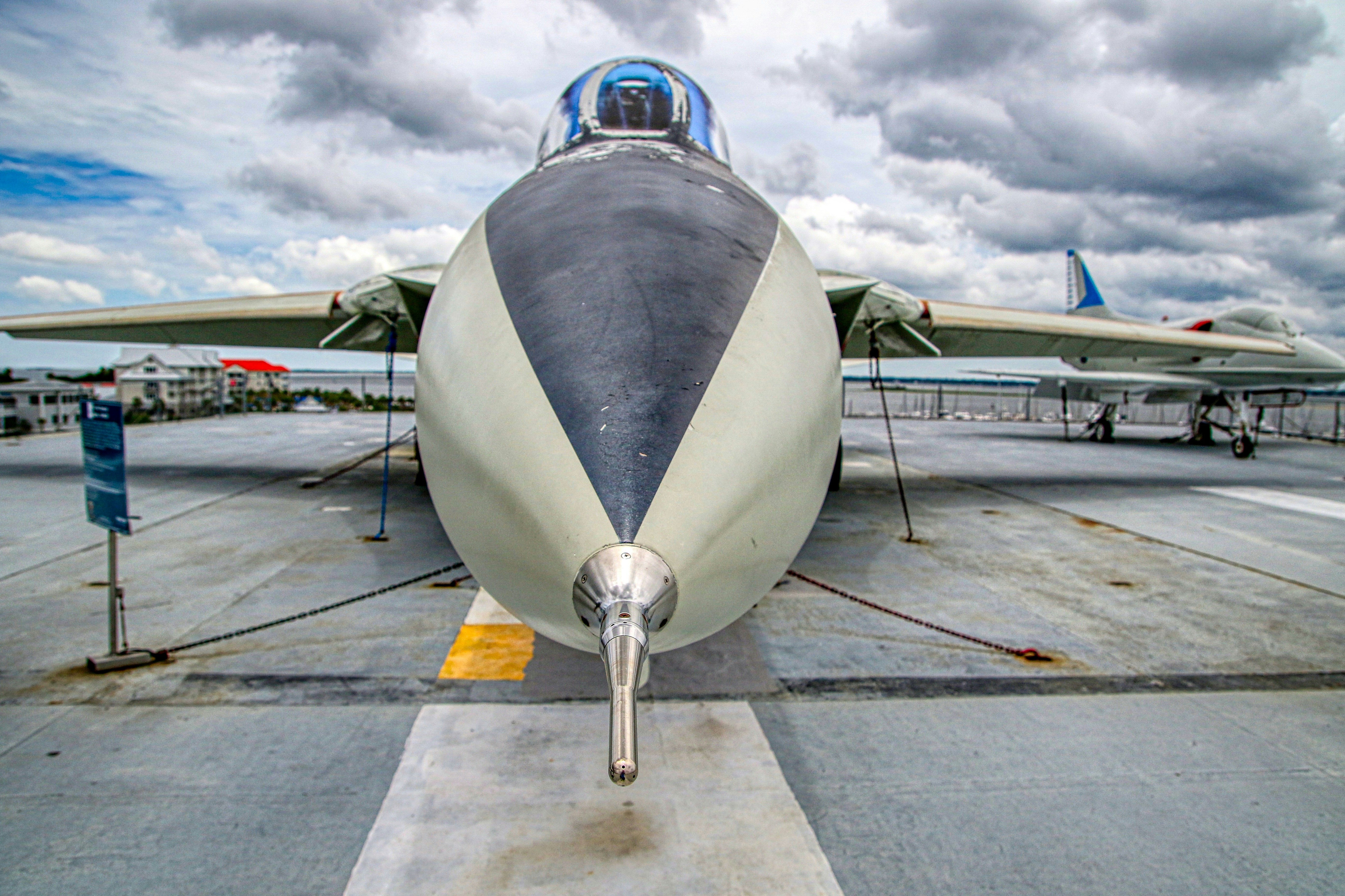 white and gray airplane under cloudy sky during daytime patriots teams background