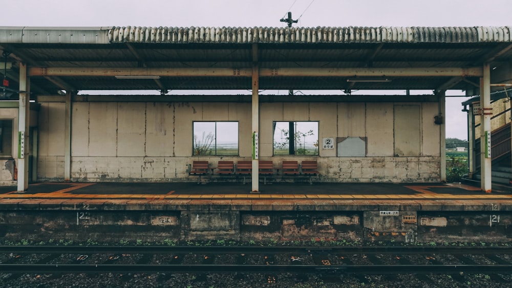 train rail near white building