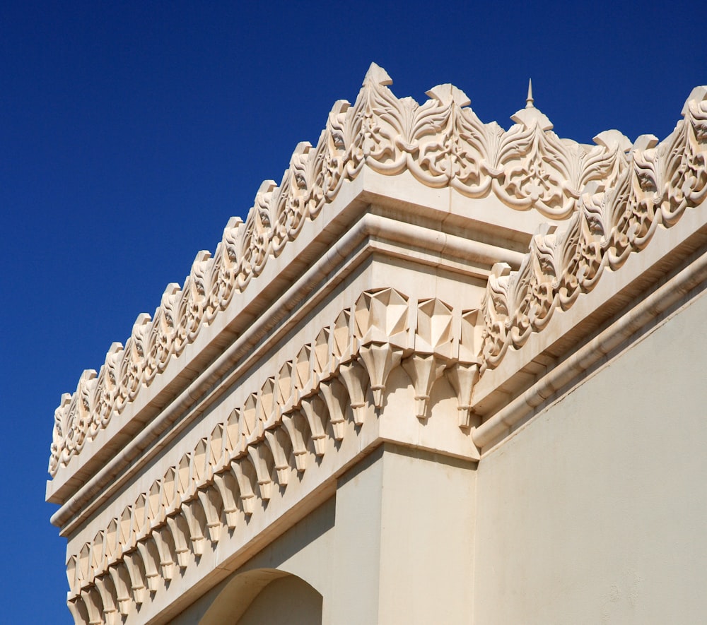 white concrete building under blue sky during daytime