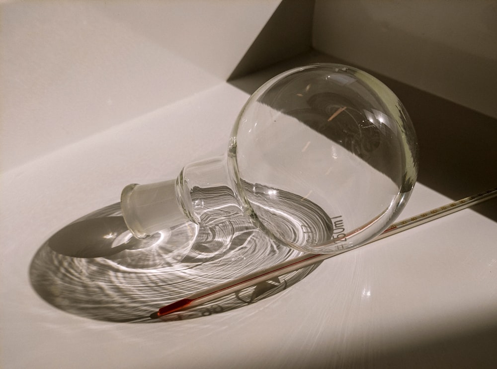 clear glass bowl on white table