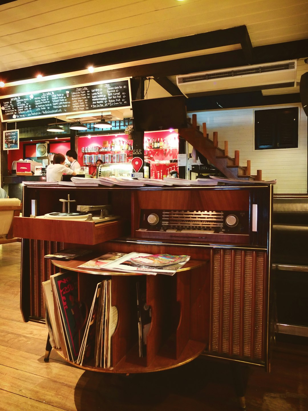 brown wooden counter with brown wooden stools