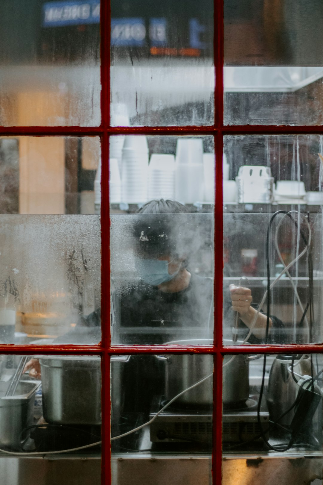 clear glass window with red frame