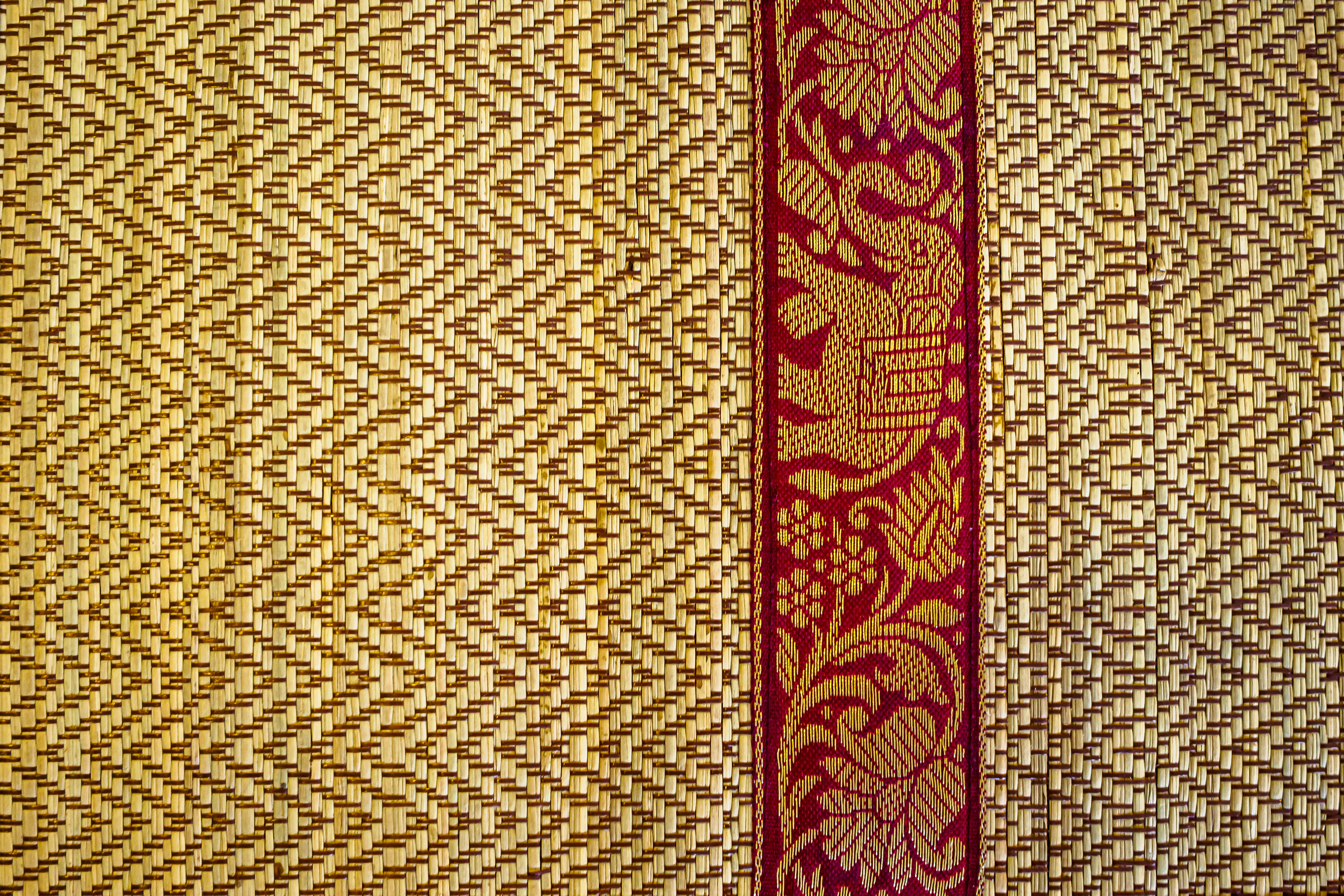 Red and brown hand-printed floral textile