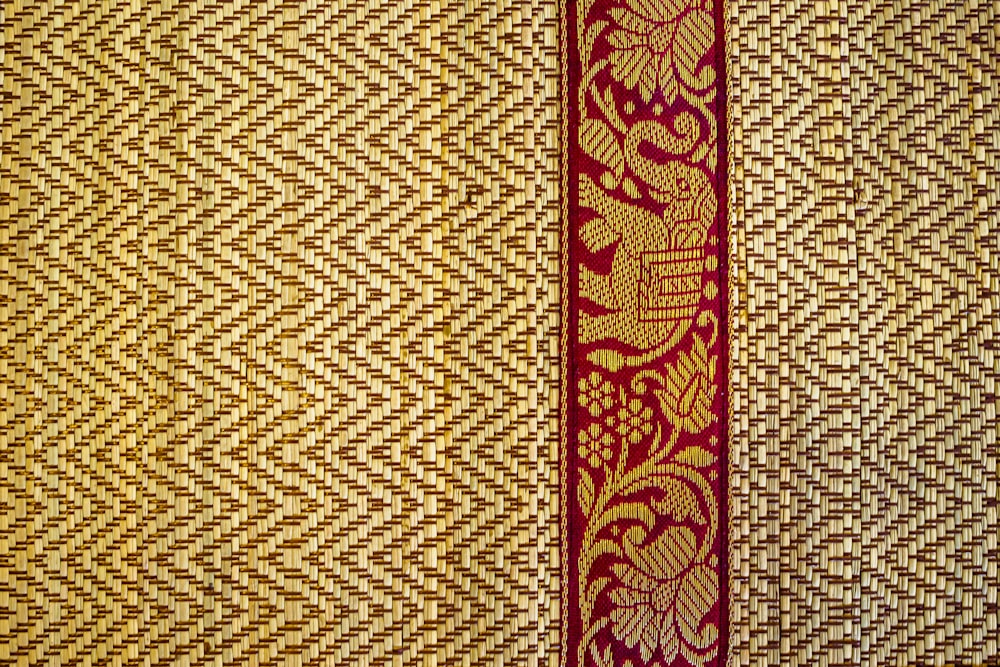 red and brown floral textile