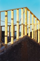 yellow and blue metal fence