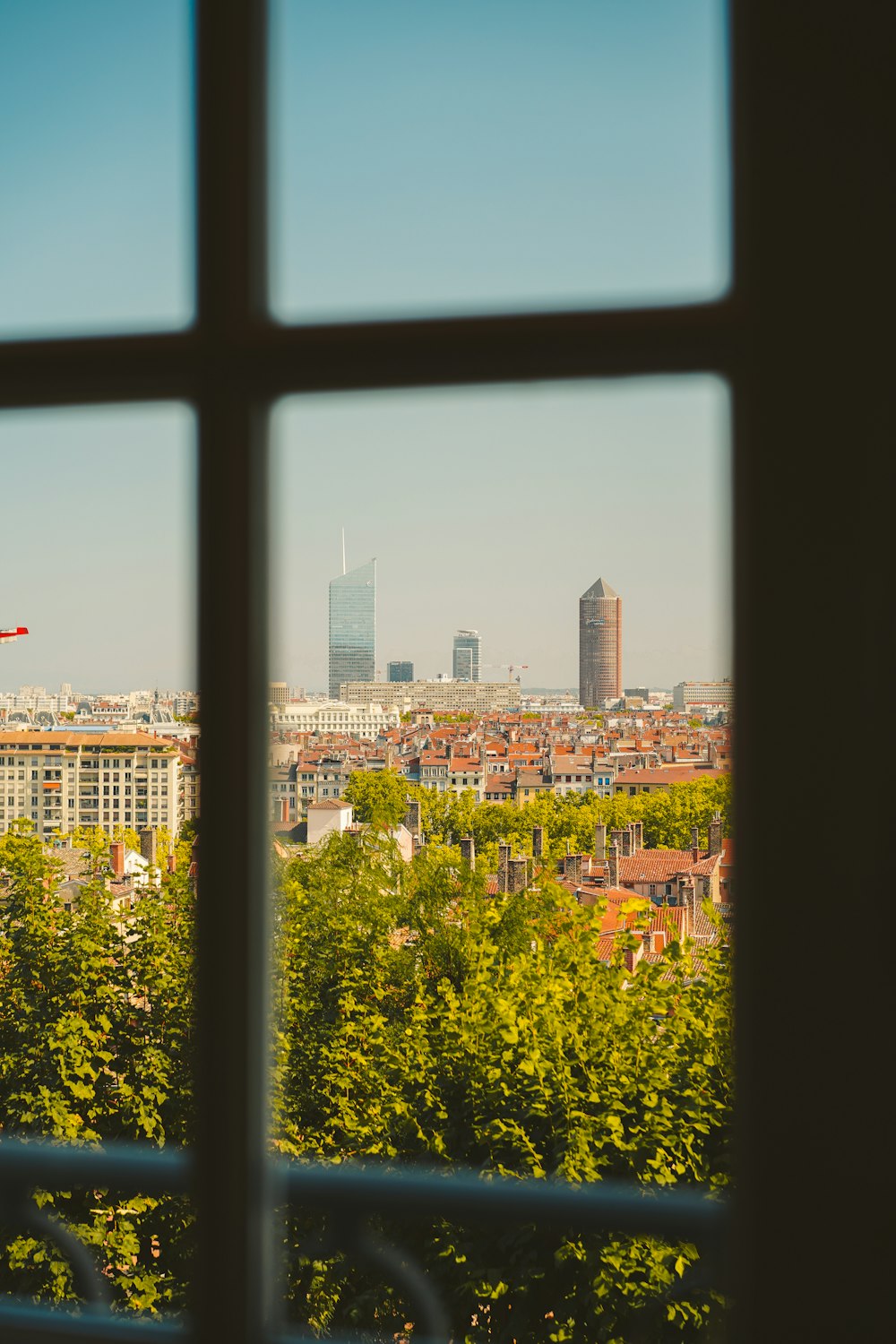 view of city buildings from window