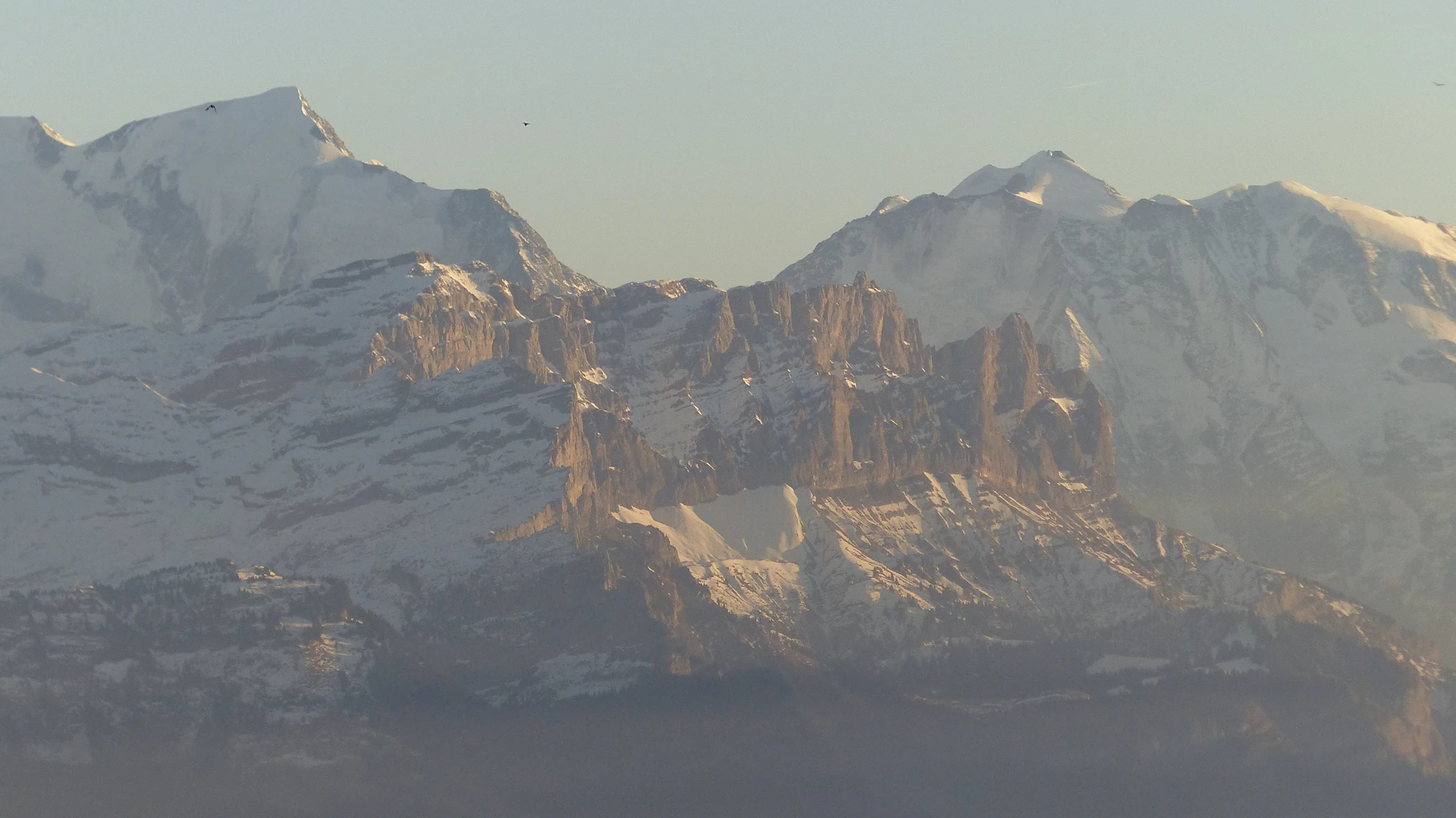brown rocky mountain under blue sky during daytime