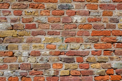 brown and white brick wall tough google meet background