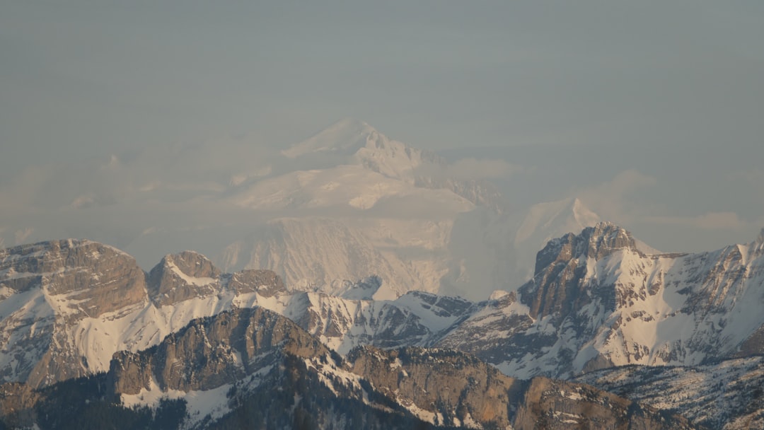 aerial view of snow covered mountains during daytime