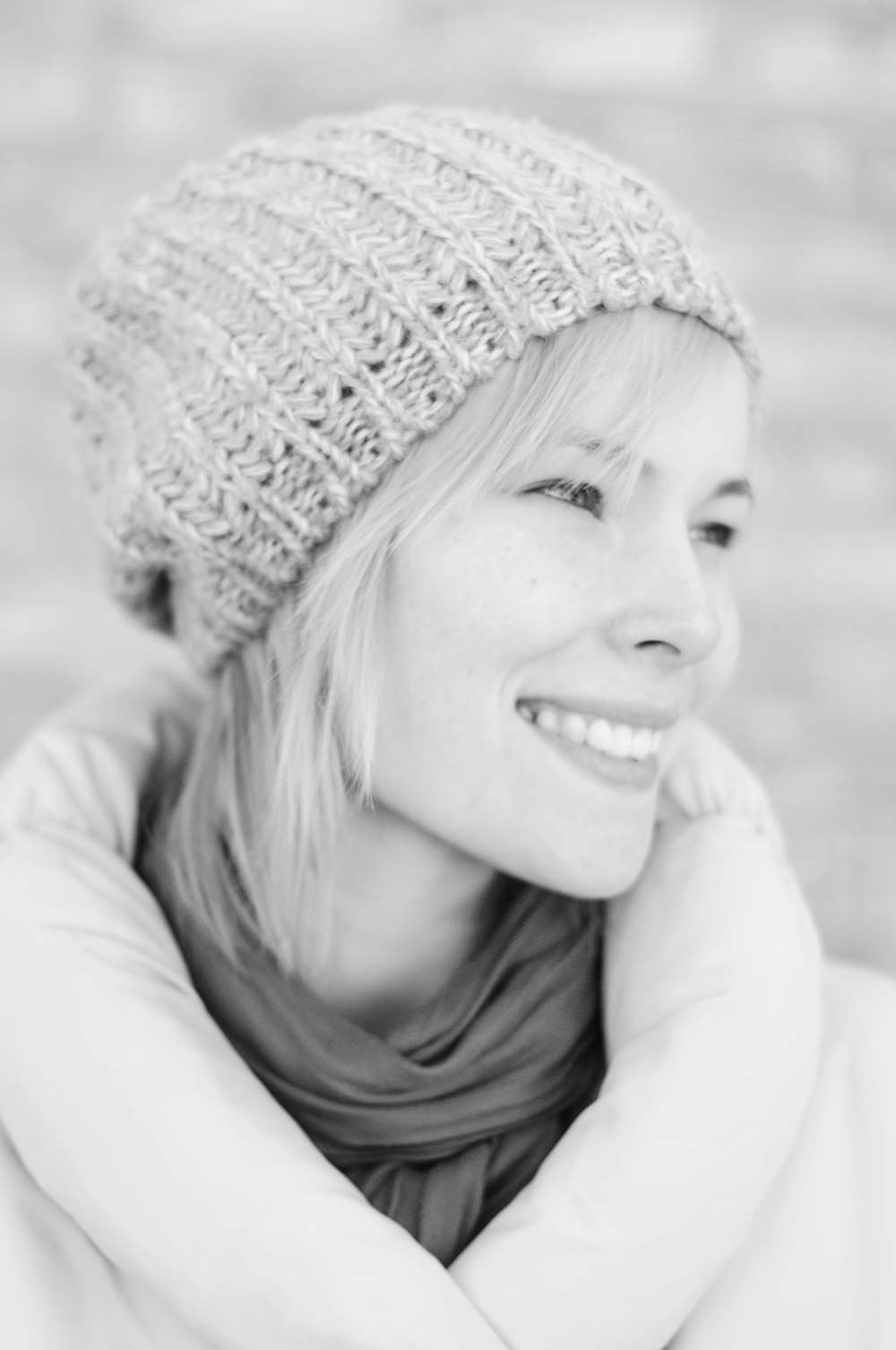 grayscale photo of smiling woman