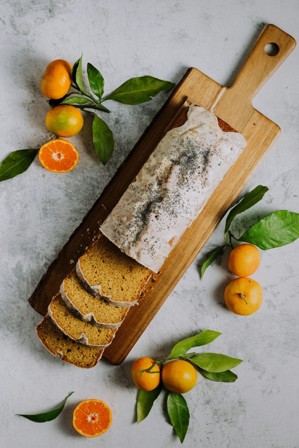 sliced of bread on brown wooden chopping board