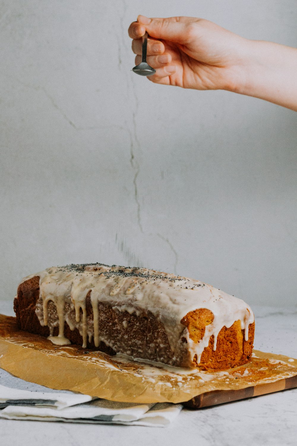 person holding brown and white bread