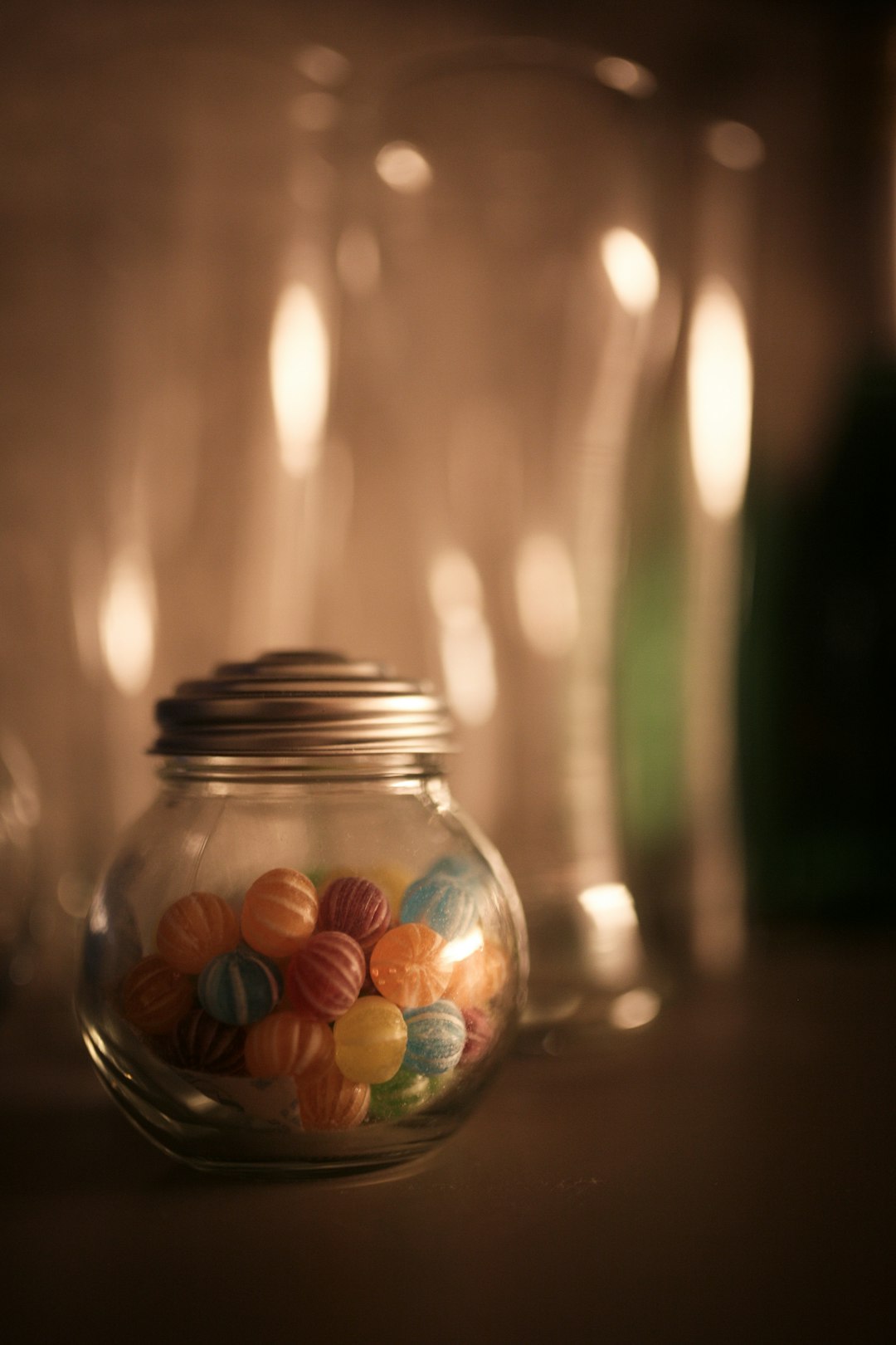 clear glass jar with candies inside