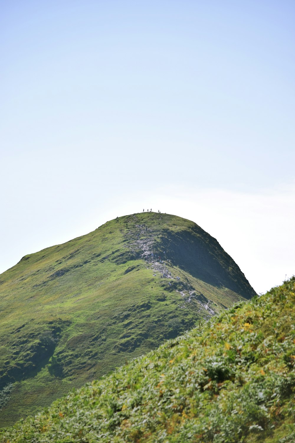 green mountain under white sky during daytime