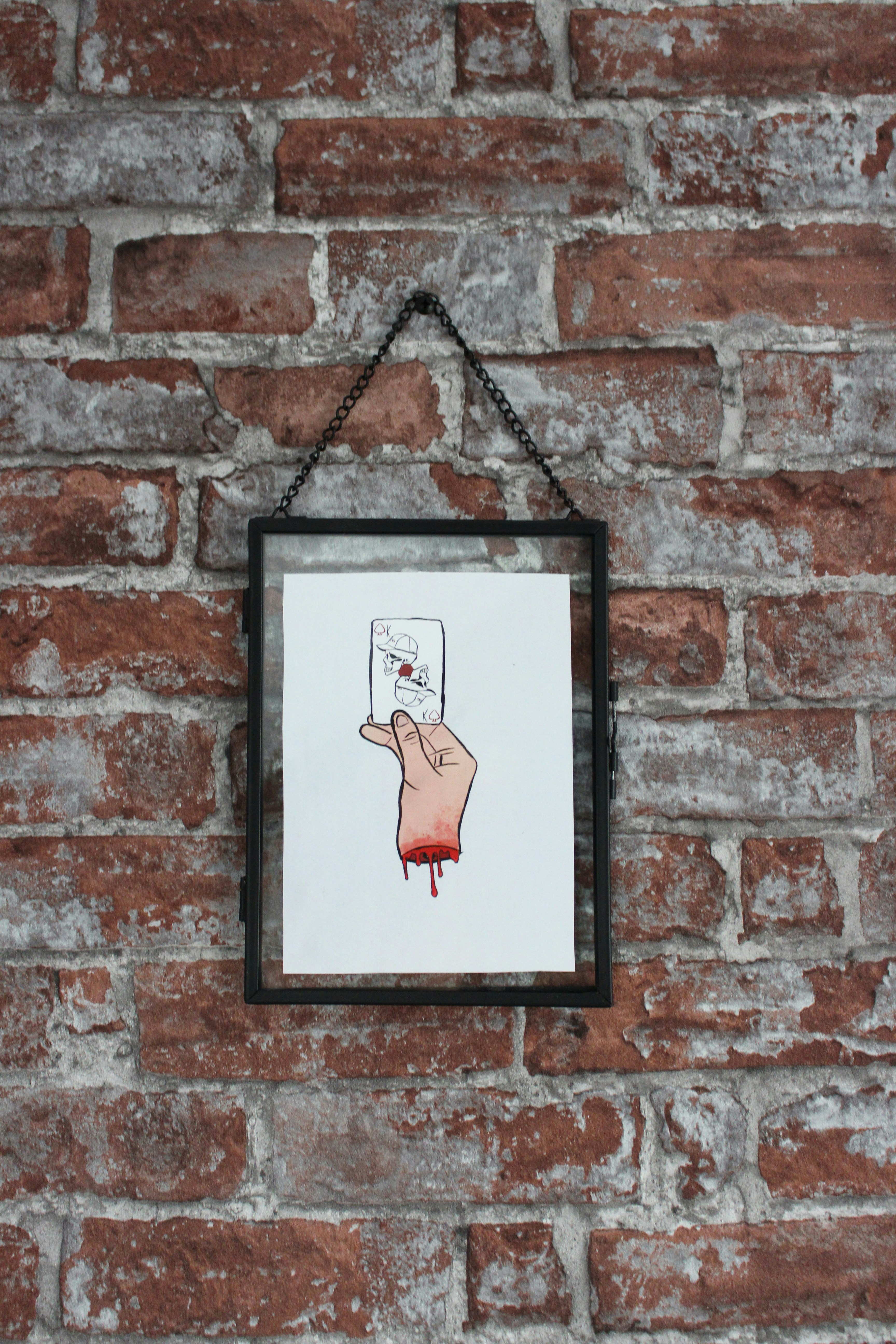 black wooden framed woman in red dress painting