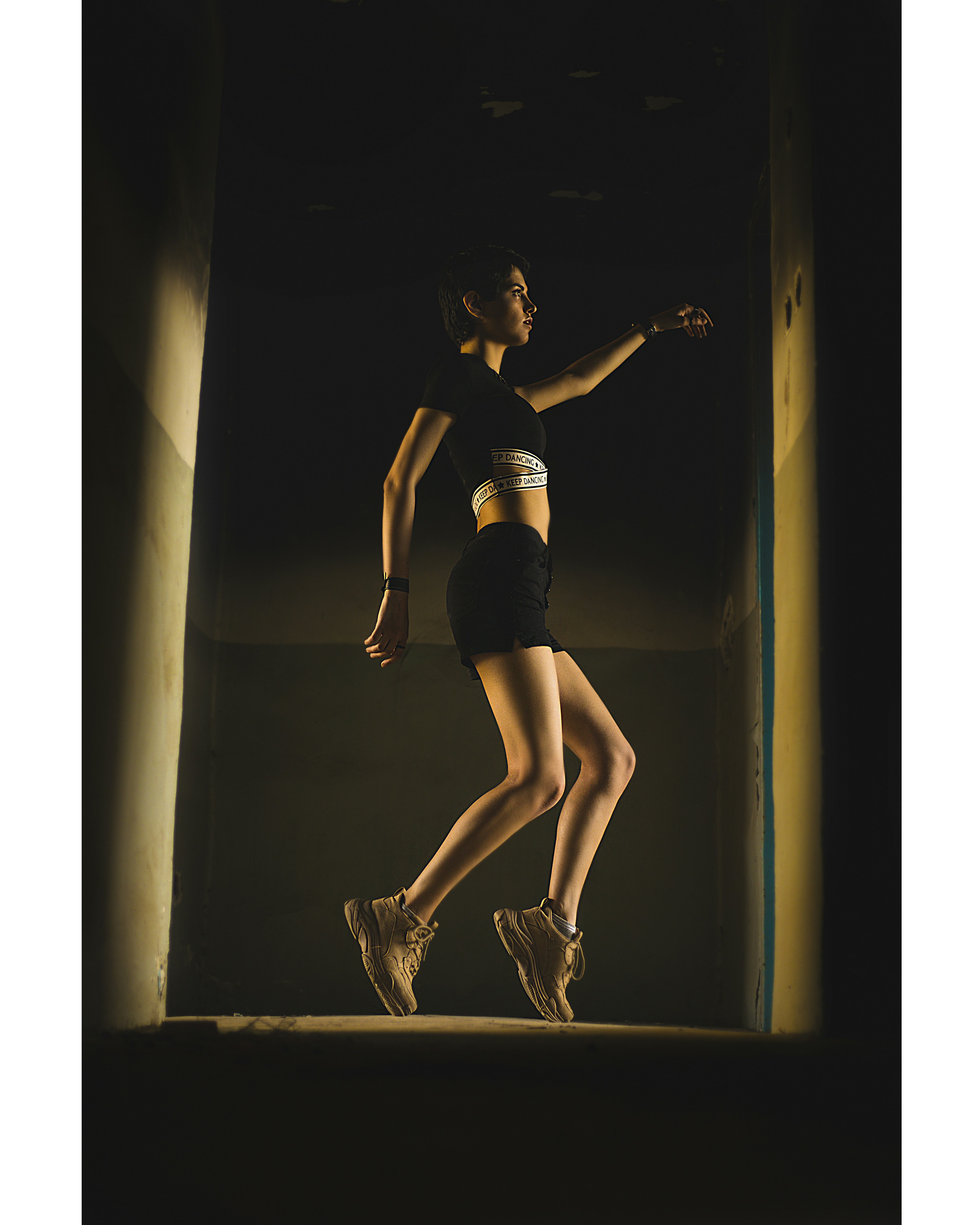 a woman is running down a flight of stairs