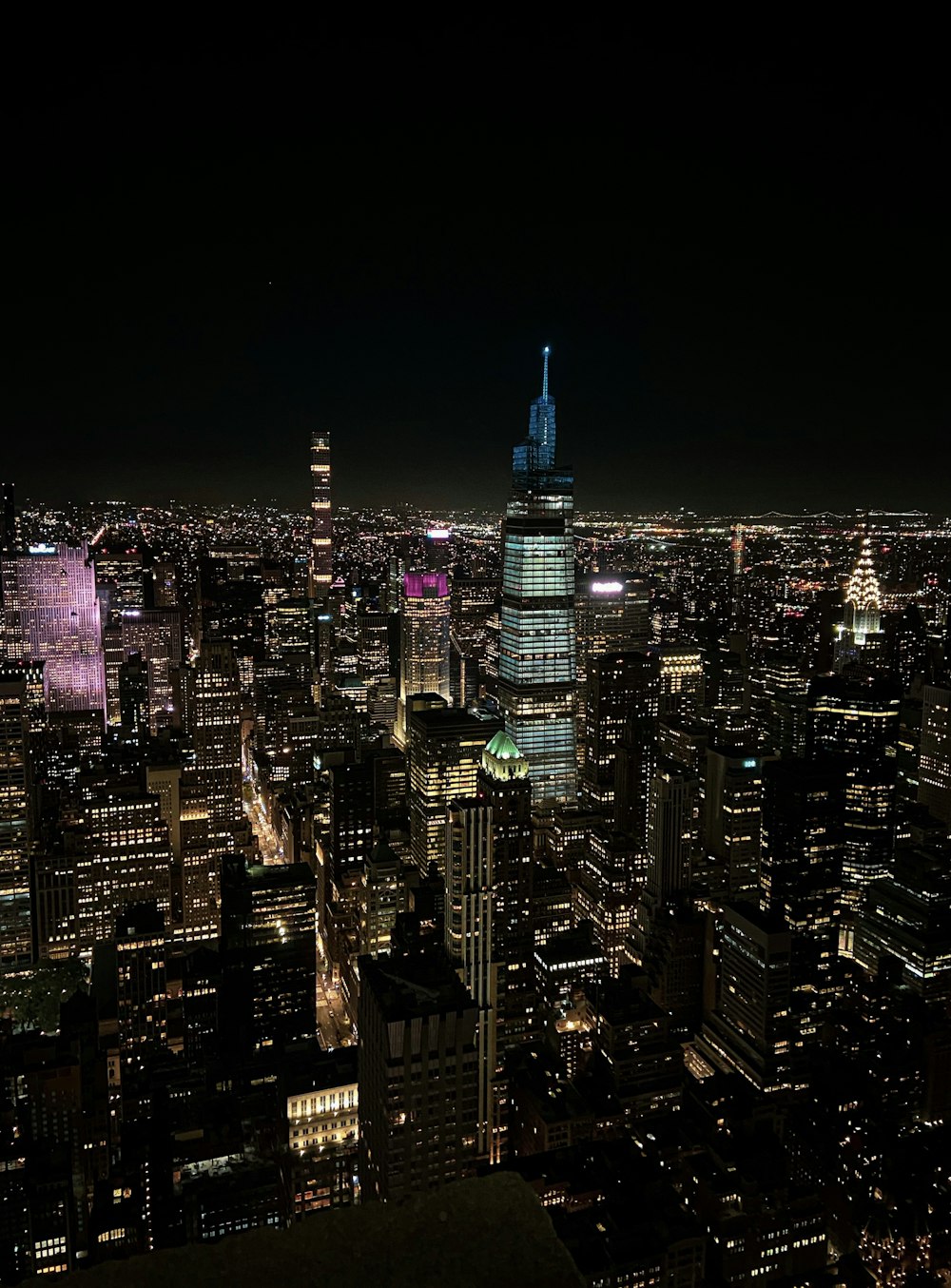 city skyline during night time