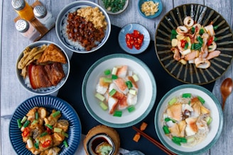 assorted food on blue ceramic plates