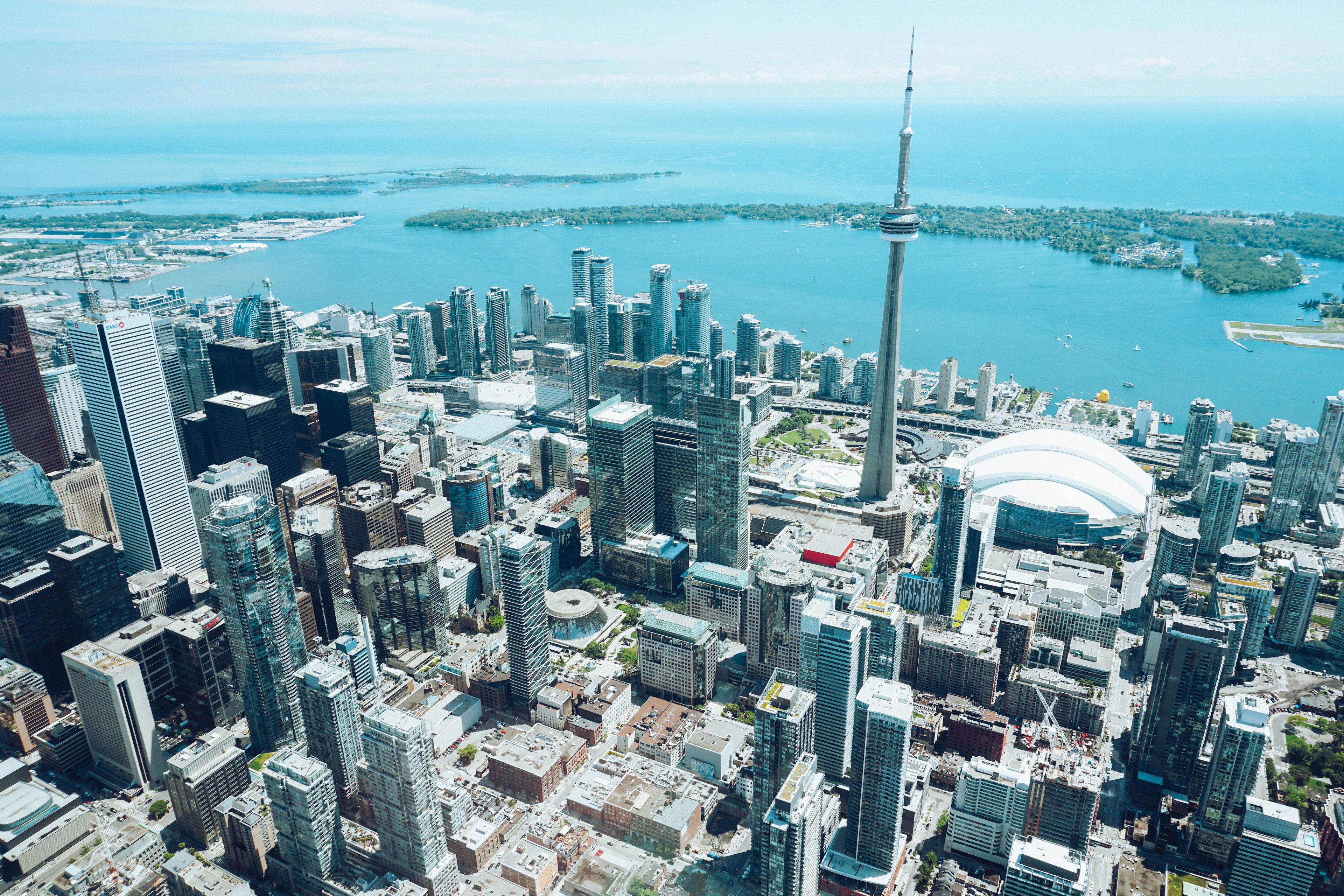 Aerial view of Toronto’s financial district and the CN Tower on the shore of Lake Ontario