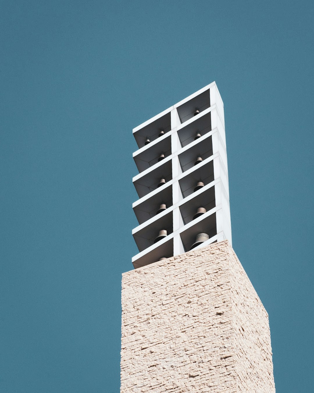 white concrete building under blue sky during daytime