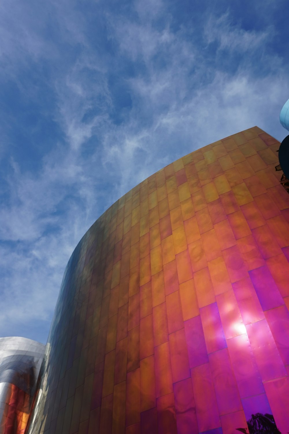 brown and purple dome building under blue sky during daytime