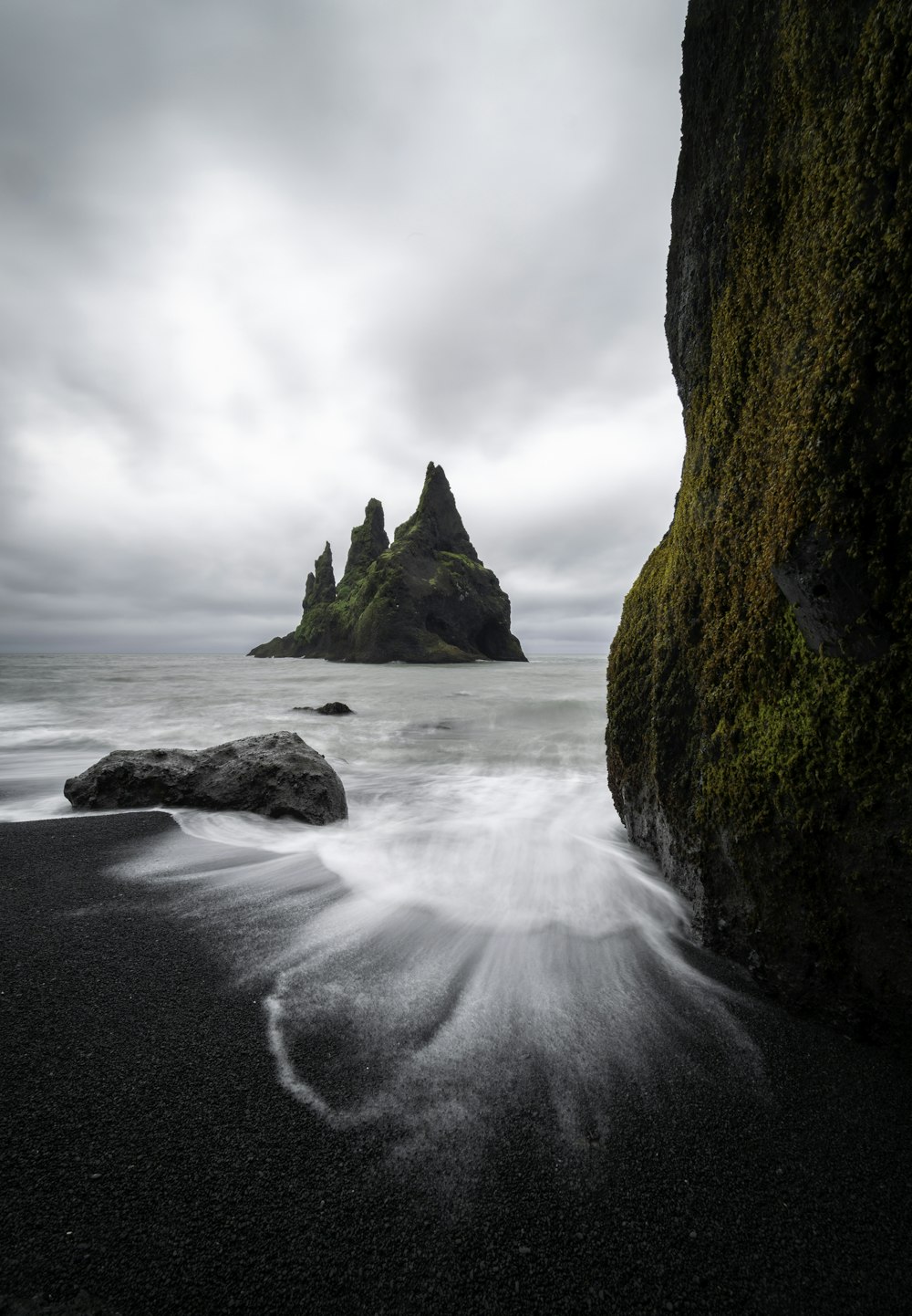 ocean waves crashing on rocky shore