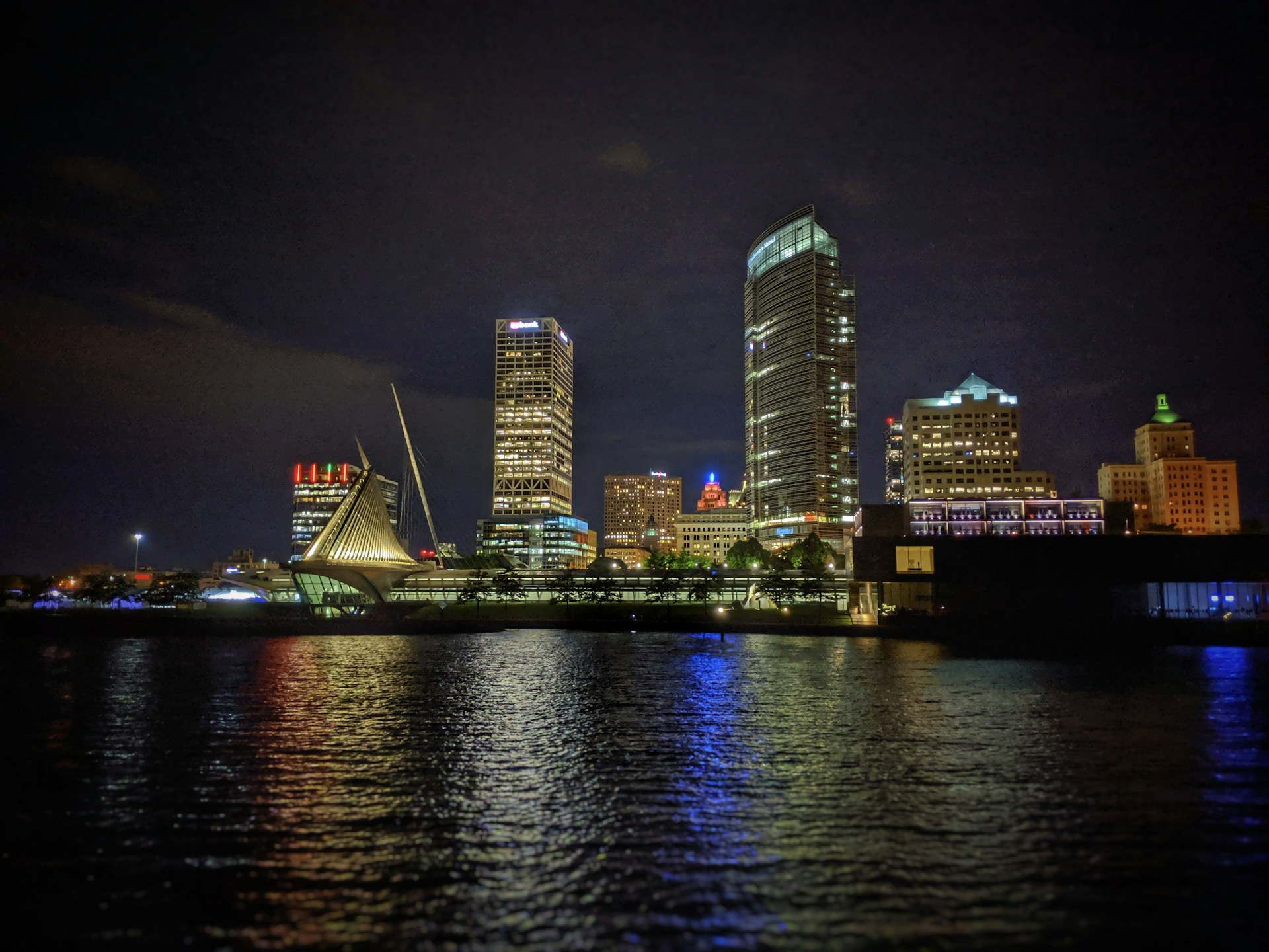 city skyline during night time