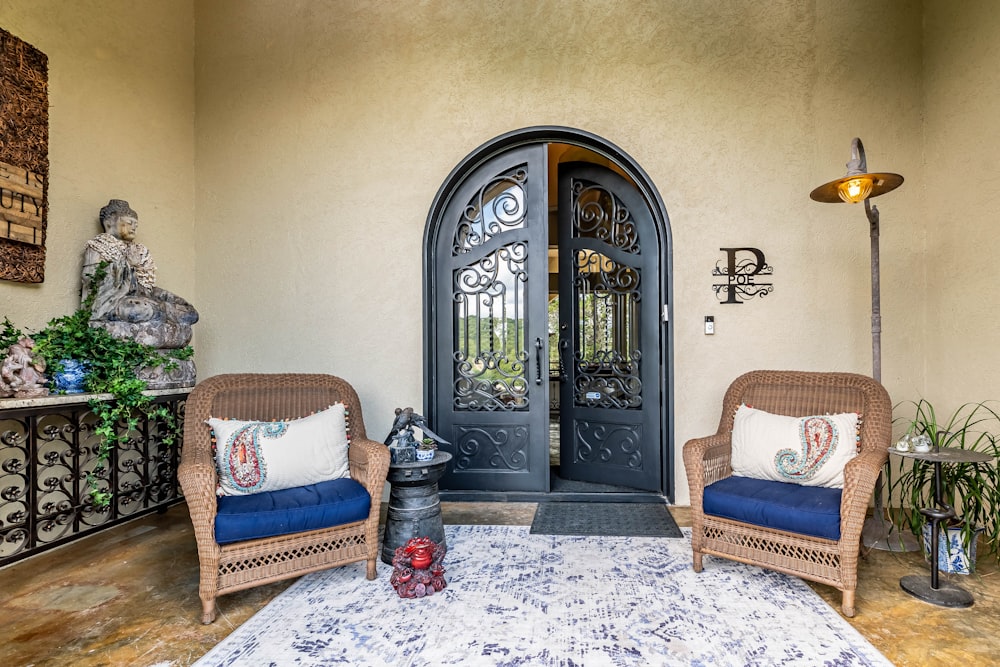 black wooden door near white and blue sofa chair