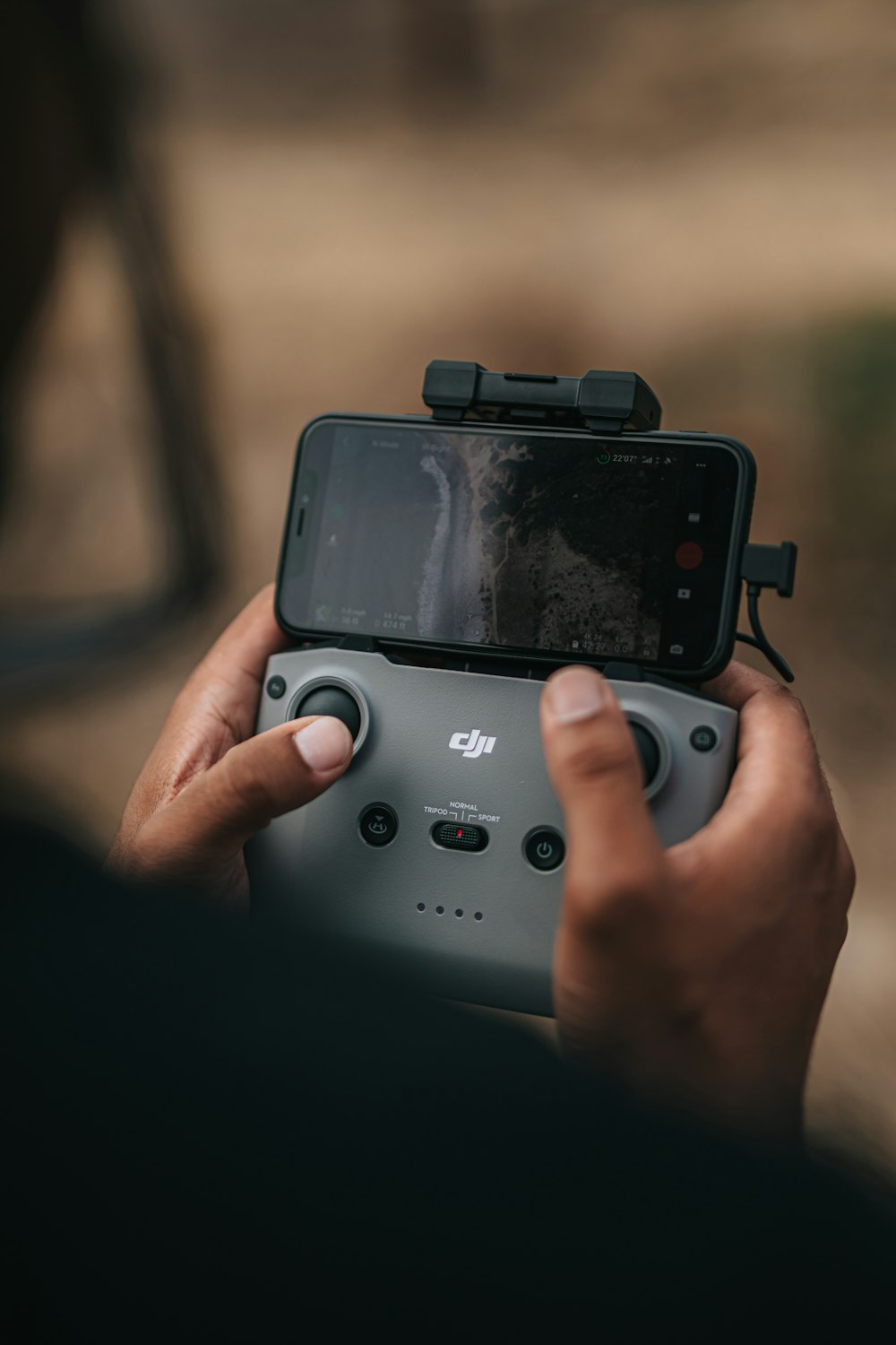 person holding black dslr camera