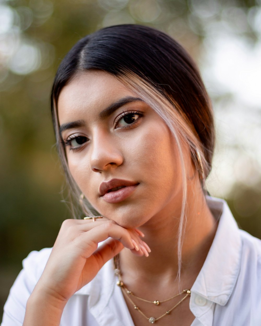 woman in white collared shirt