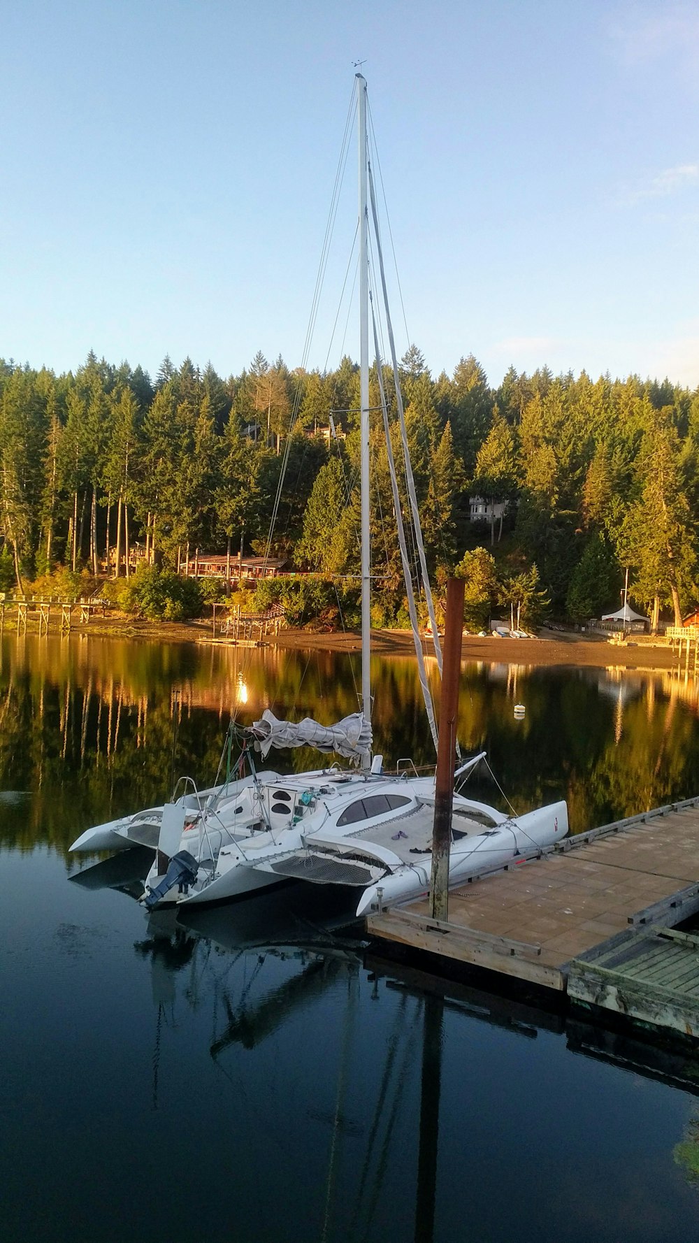 white and black plane on dock during daytime