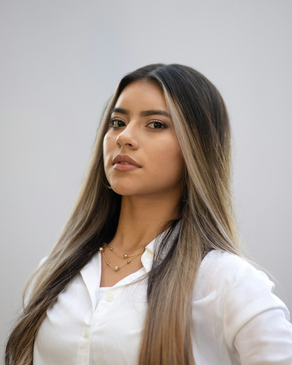 woman in white dress shirt