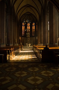 brown wooden chairs inside church