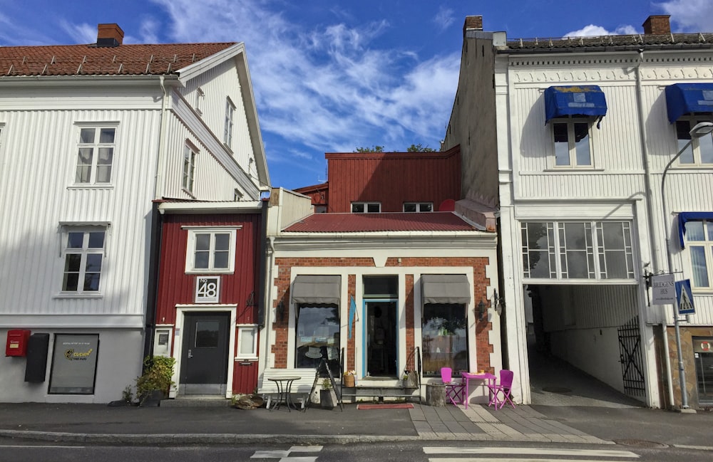 red and white concrete building under blue sky during daytime