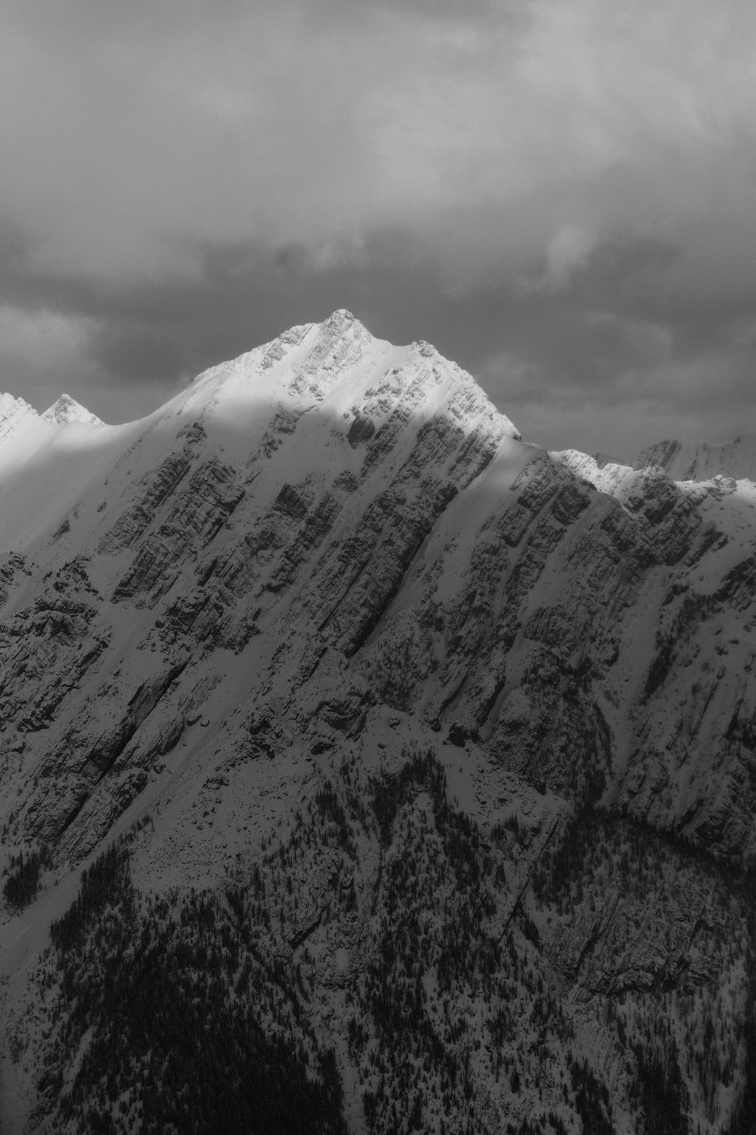 grayscale photo of snow covered mountain