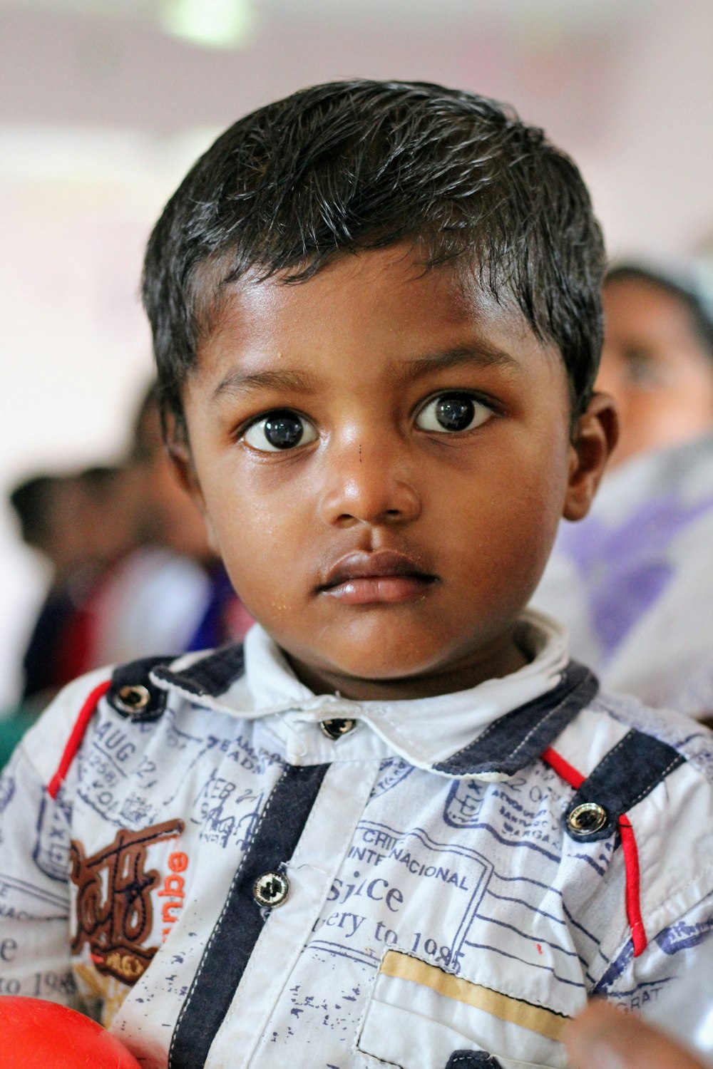 boy in gray and white button up shirt