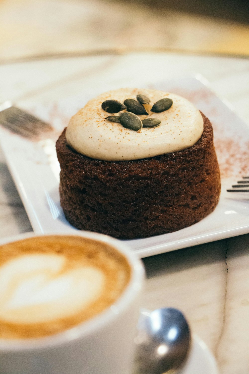 chocolate cake on white ceramic plate