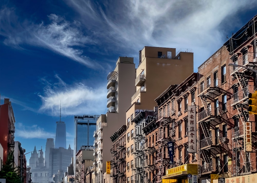 white and brown concrete buildings under blue sky during daytime