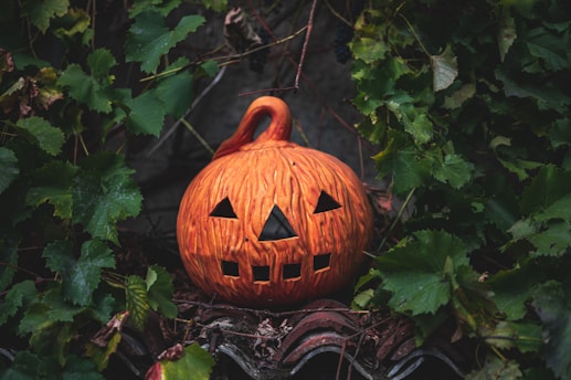 jack o lantern on black and white surface