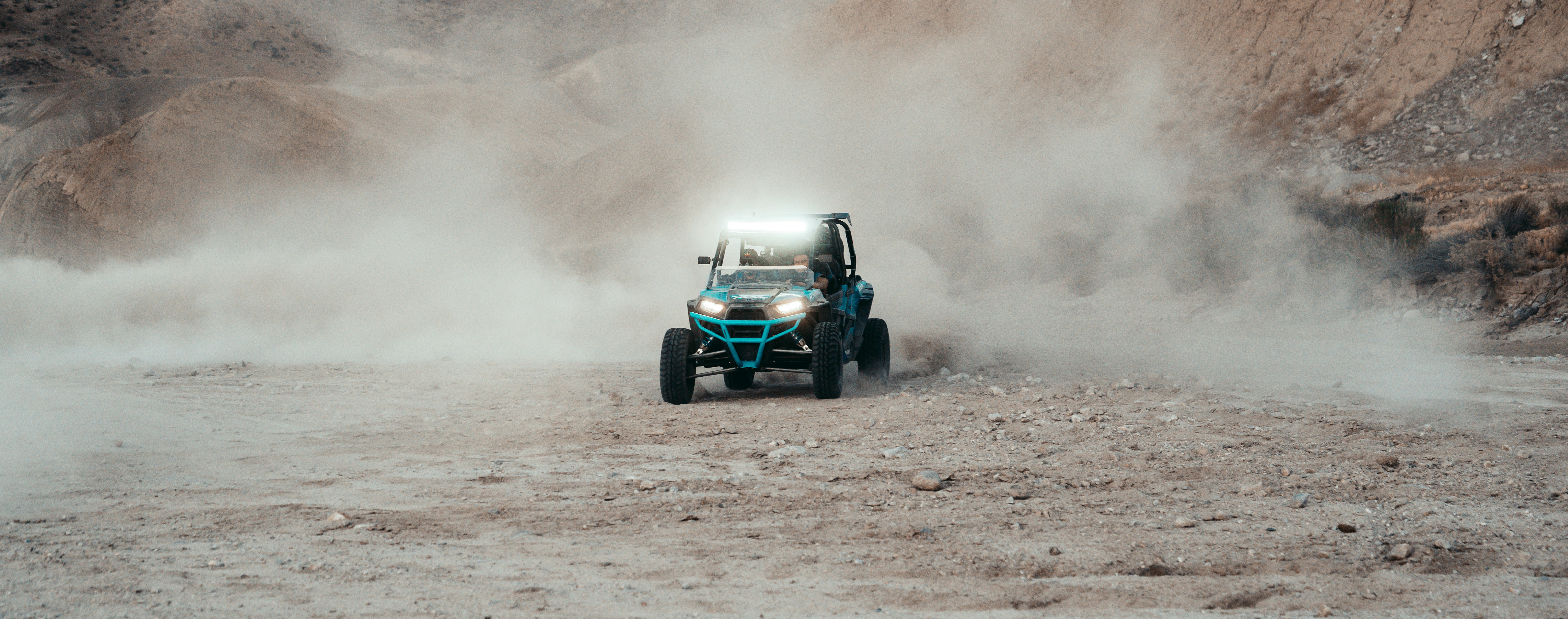 black and blue f 1 car on brown soil, 