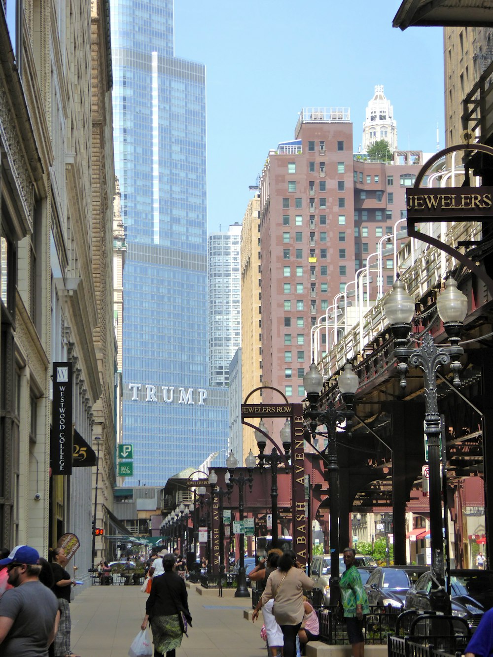 people walking on street near buildings during daytime